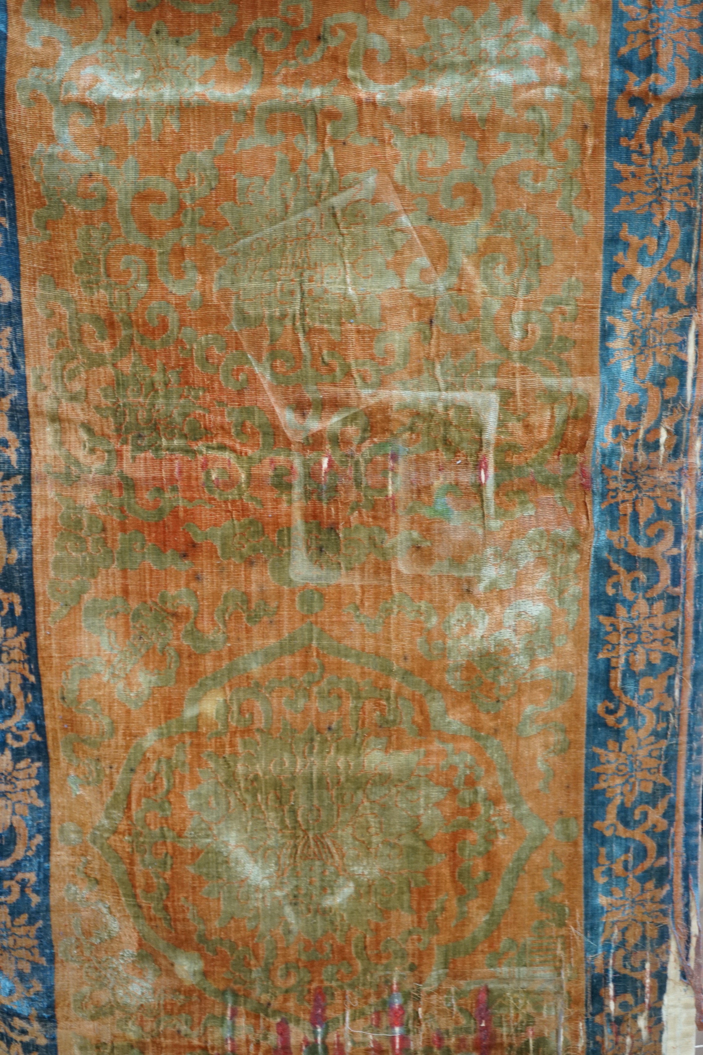 A Chinese cut velvet panel and 3 runners